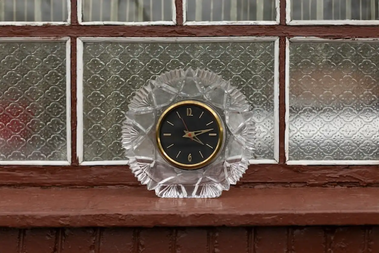 Circular clock indoors still life