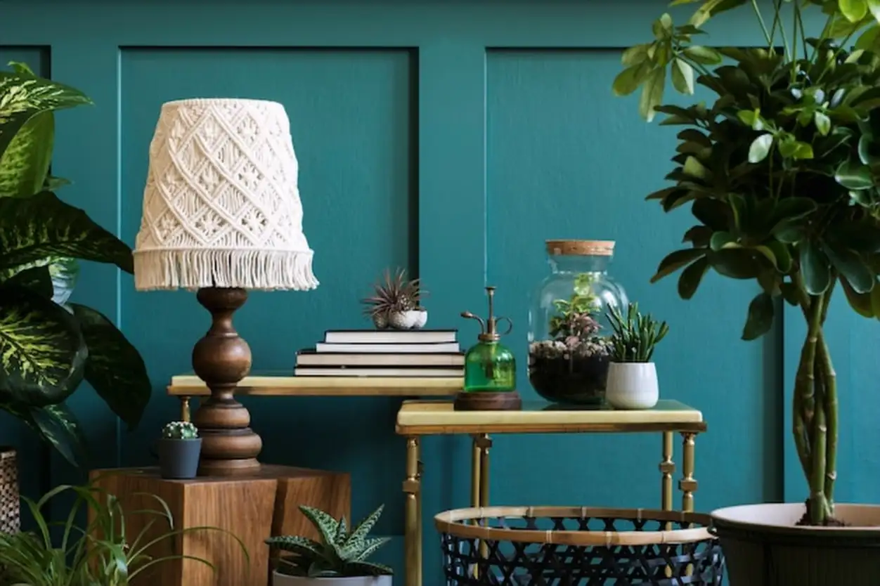 Modern composition of home garden filled a lot of beautiful plants, cacti, succulents, air plant in different design pots. Stylish botany interior. Green wall paneling. Template Home gardening concept