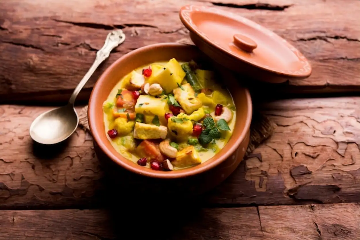 Navratan Korma is a rich creamy and flavourful Mughlai dish from India that literally translates to nine gem curry The gems are the fruits vegetables and nuts that make up the curry