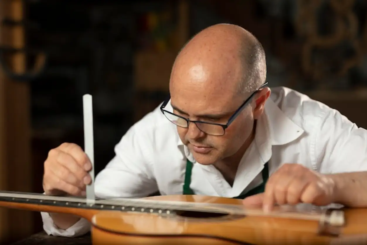 Man making instruments in his workshop