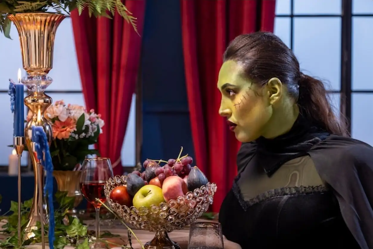 Frankenstein sitting at table side view