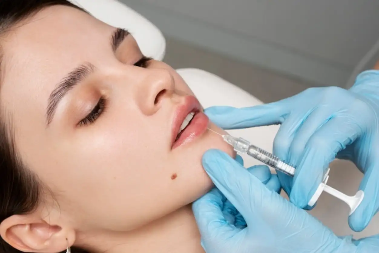 Close up woman getting lip fillers